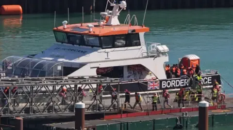 First British Legal Objection Filed Against 'One In, One Out' Deal